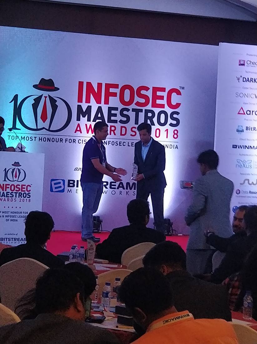 Sanil Nadkarni receiving a trophy at the Infosec Maestros Awards 2018
